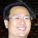 [photo of Alex Tan]